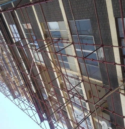 This is Reynard Hall Building in Hillbrow.  We replaced  broken windows,  putty , derusted all frames ,  treated spalling Concrete and painted the 14 story building.  Contact details , Reynard Hall  Board of Trustees Chairman  0824900105