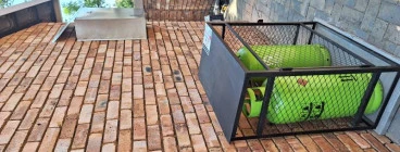 GAS GEYSER INSTALLED WITH CAGE AND CYLINDERS